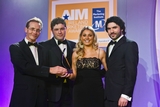 John Boyle, Ulster Bank (sponsor of the Small Business  Marketing Award) with award winners Robert White, Laura Nolan and Declan White, Eurieka IT Services